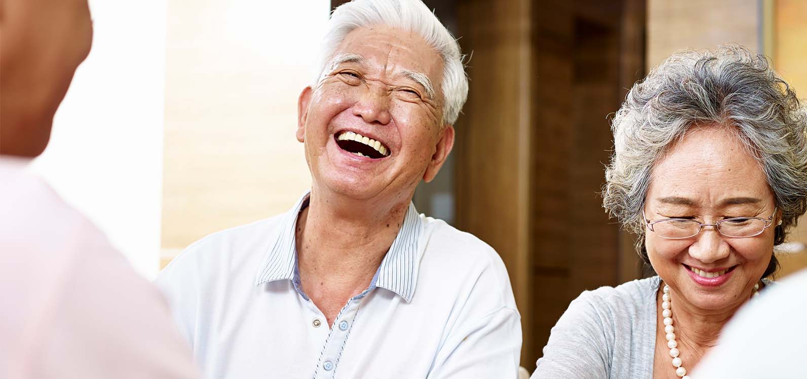 friends laughing at tea